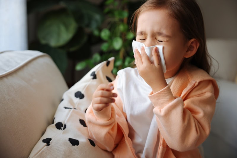 A child sneezing.